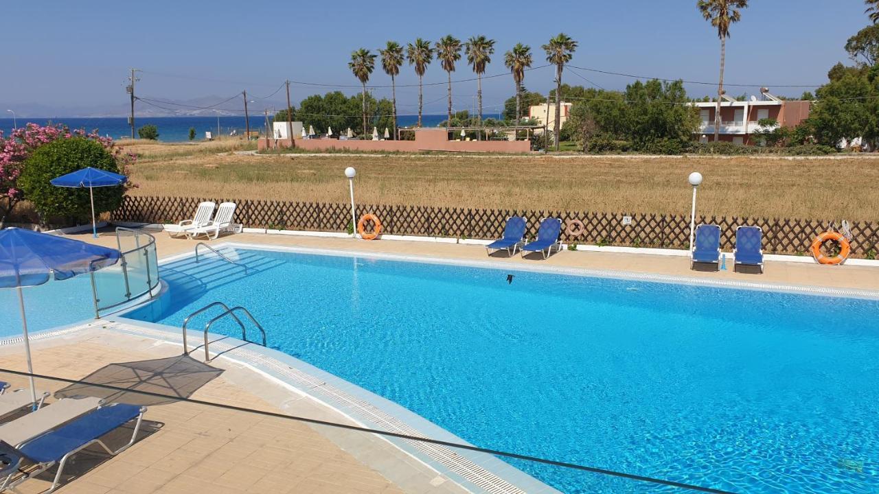 Miros Hotel Apartments Тигаки Экстерьер фото