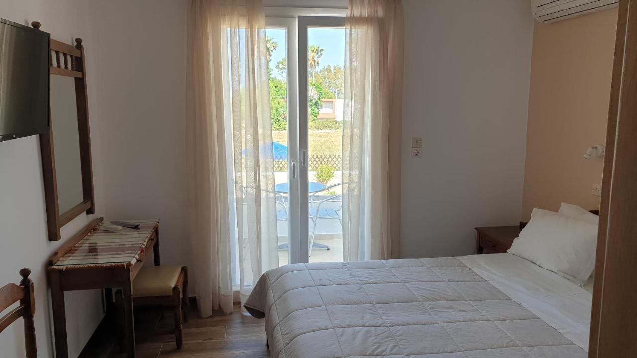 Miros Hotel Apartments Тигаки Экстерьер фото