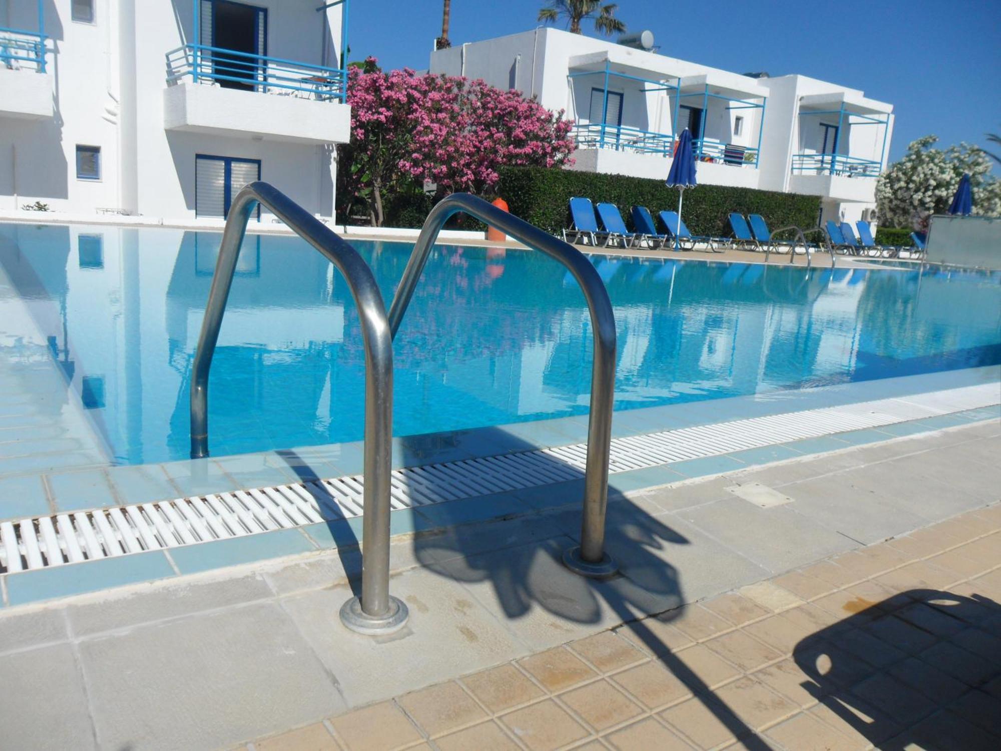 Miros Hotel Apartments Тигаки Экстерьер фото