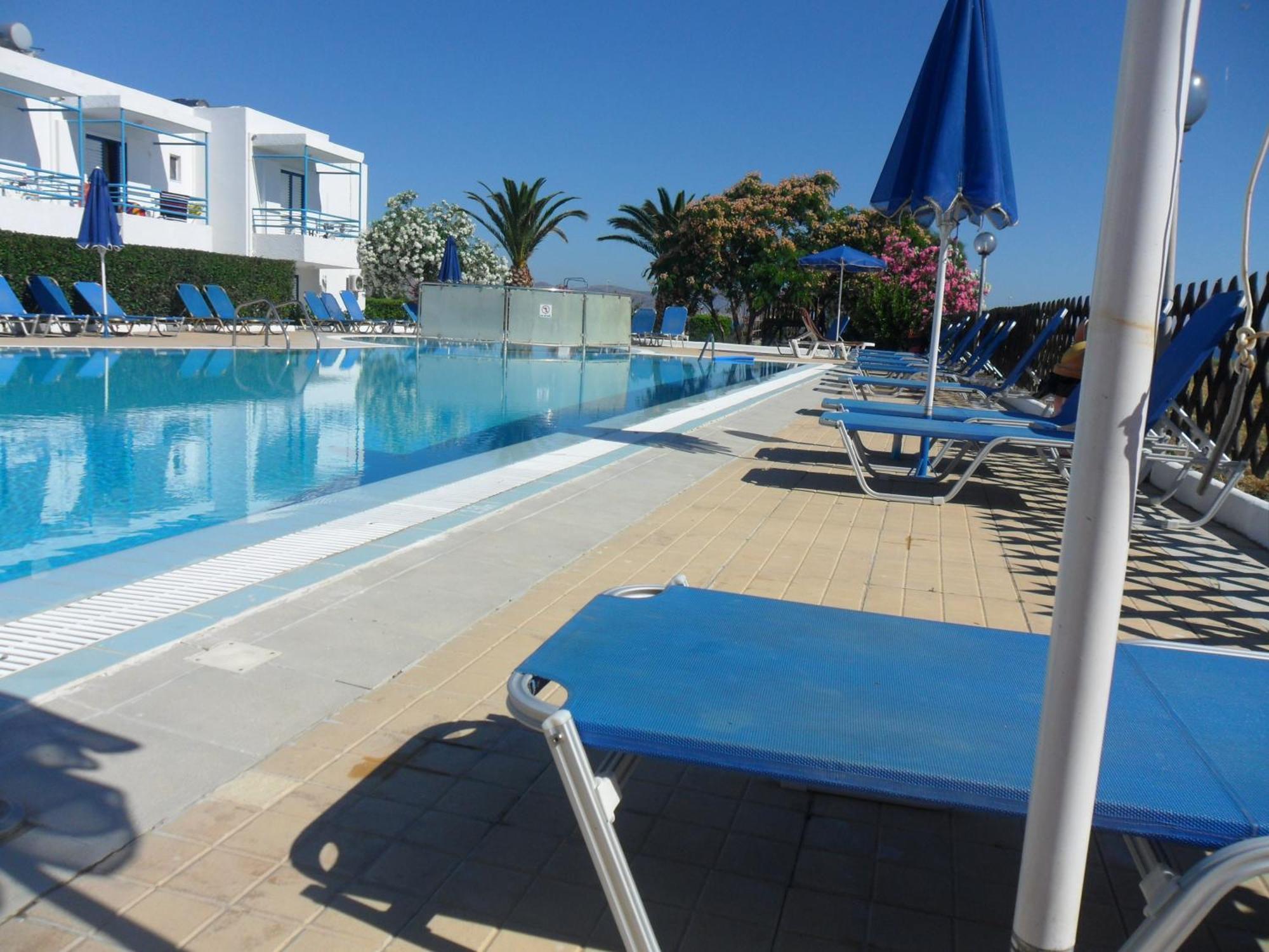 Miros Hotel Apartments Тигаки Экстерьер фото