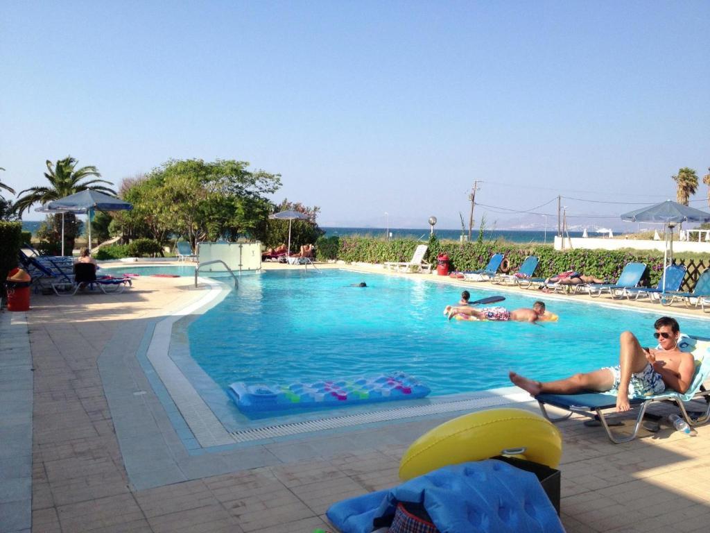 Miros Hotel Apartments Тигаки Экстерьер фото